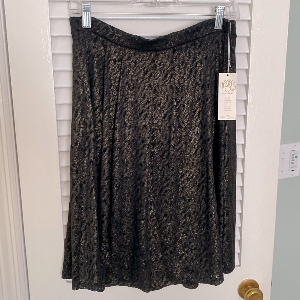 Black and metalic gold weave skirt perfect for the holidays!  NWT